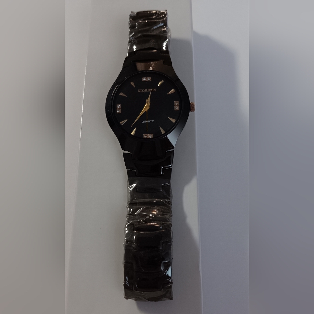 Black and Gold Watch with Sleek Design